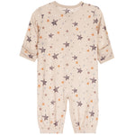 A baby long-sleeve footless one-piece jumpsuit in a warm beige color, decorated with an all-over pattern of stars in dark brown, orange, and light gray, shown against a plain white background.