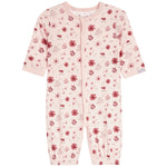 A baby long-sleeve footless one-piece sleeper in light pink with a red and dark pink floral pattern, featuring a snap-button front closure.
