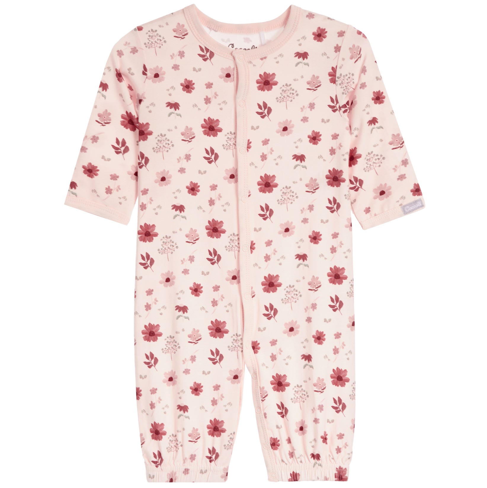 A baby long-sleeve footless one-piece sleeper in light pink with a red and dark pink floral pattern, featuring a snap-button front closure.