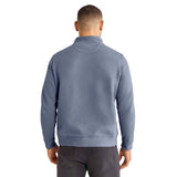 A man viewed from the back wearing a textured, ribbed knit mock-neck sweater in a dusty slate blue color against a plain white background.
