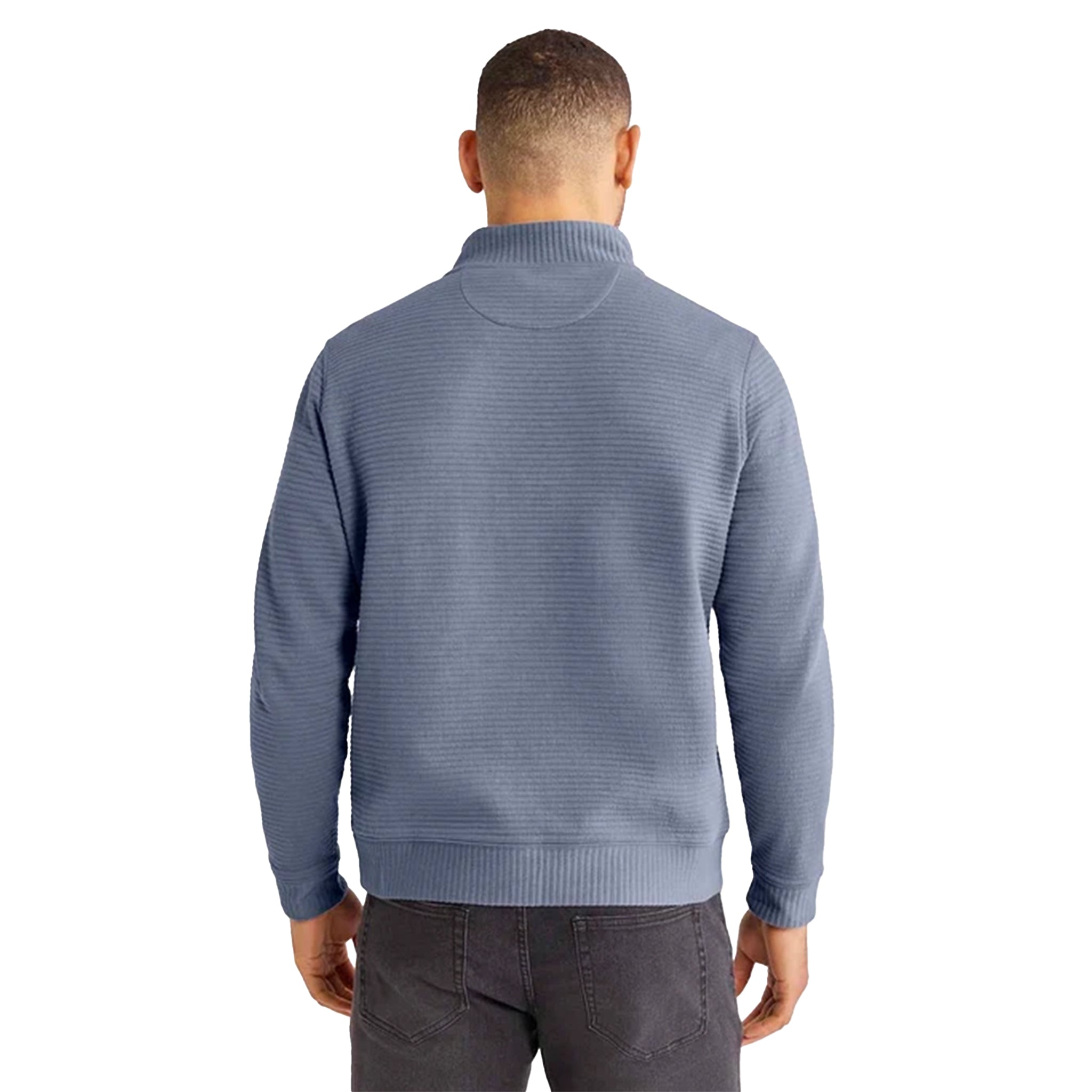 A man viewed from the back wearing a textured, ribbed knit mock-neck sweater in a dusty slate blue color against a plain white background.