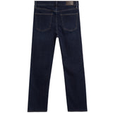 Back view of dark blue denim jeans on a white background, showing the back pockets and a brown leather brand patch at the waistband.