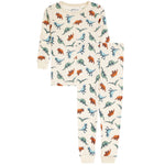 A two-piece children's pajama set  featuring a long-sleeve top and matching pants in cream with an all-over colorful dinosaur print.