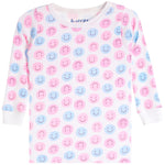 A white long-sleeve baby top with an all-over pattern of pink and light blue smiley faces, featuring a crew neck and ribbed cuffs.