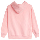 A light pink hooded sweatshirt with a subtle all-over polka dot pattern, shown from the back on a solid white background.