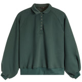 A dark green long-sleeve pullover sweatshirt with a buttoned collar, shown flat against a plain white background.