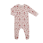 Floral patterned baby onesie on a white background