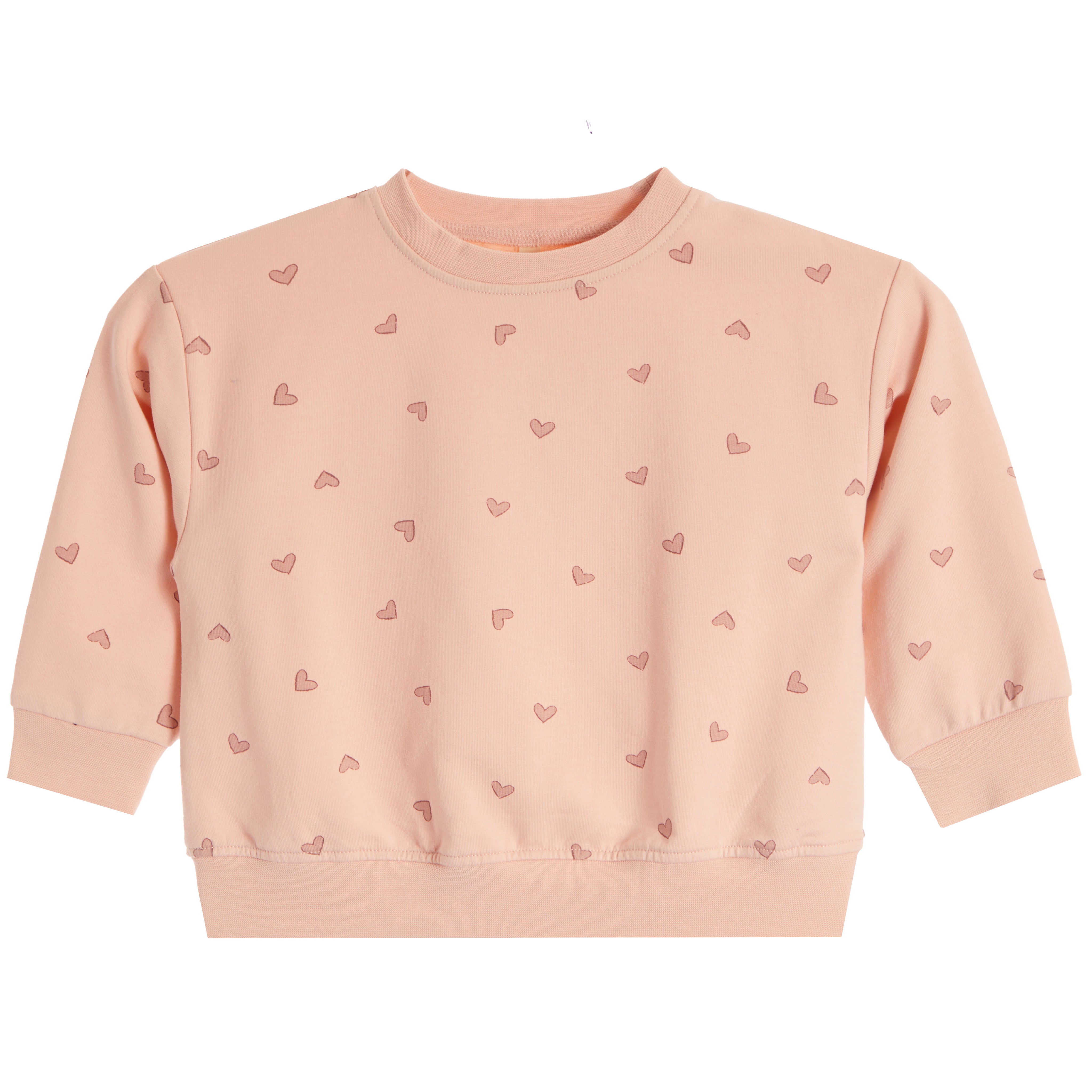 A light peach-pink long-sleeve baby's crewneck sweatshirt with a repeating pattern of small pink hearts, shown flat against a white background.