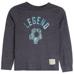 A toddler's long-sleeve t-shirt in dark heather gray, featuring a distressed blue graphic on the front with the word 'LEGEND' above a soccer ball, and a small beige brand patch near the bottom right hem.