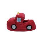 A red plush toy car slipper with a small yellow light on top, designed to look like a cab truck with gray wheels and a blue window.
