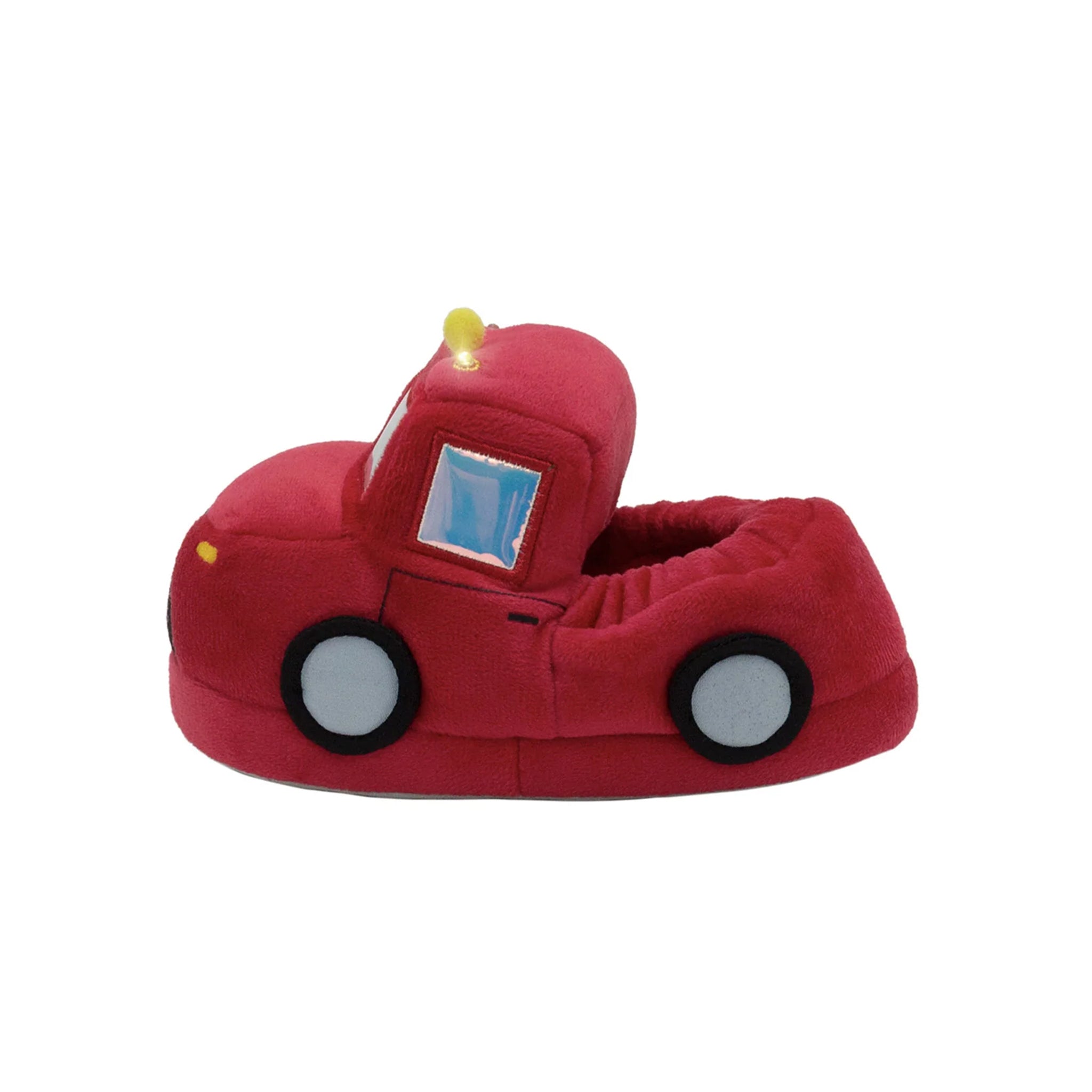 A red plush toy car slipper with a small yellow light on top, designed to look like a cab truck with gray wheels and a blue window.