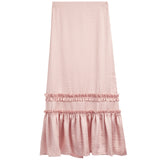 A light pink midi skirt with a textured crinkle fabric, featuring a double-tiered ruffle hem design, shown flat on a white background.