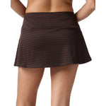 A dark brown patterned skirt worn by a model, shown from the back against a plain white background.