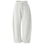 Light heather gray wide-leg sweatpants with an elastic waistband and drawstring, shown against a plain white background.