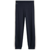A pair of navy blue sweatpants with white side stripes, shown flat against a solid white background.