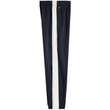 A pair of navy blue athletic pants with a vertical white stripe running down the center of each leg, shown against a plain white background.