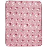 A square pink blanket with rounded corners, featuring an all-over pattern of small hearts in dark red, white, and light pink, shown flat against a white background.