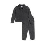A two-piece kids' black sweatshirt and jogger pants set with a small white rectangular logo patch on the chest and thigh, displayed on a clean white background.