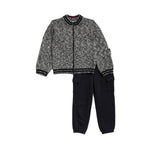 A children's two-piece outfit set featuring a black and white marled knit zip-up jacket with ribbed trim, paired with solid black cargo pants, shown on a plain white background.