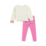 A children's two-piece outfit set featuring a cream cable-knit long-sleeve sweater with pink bow accents on the cuffs, paired with bright pink leggings, shown on a plain white background.