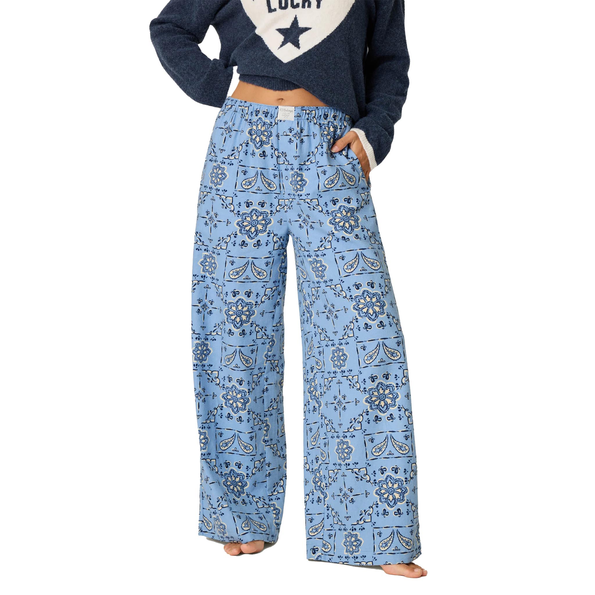 light blue flannel wide-leg pants with a blue, gray, and white paisley pattern