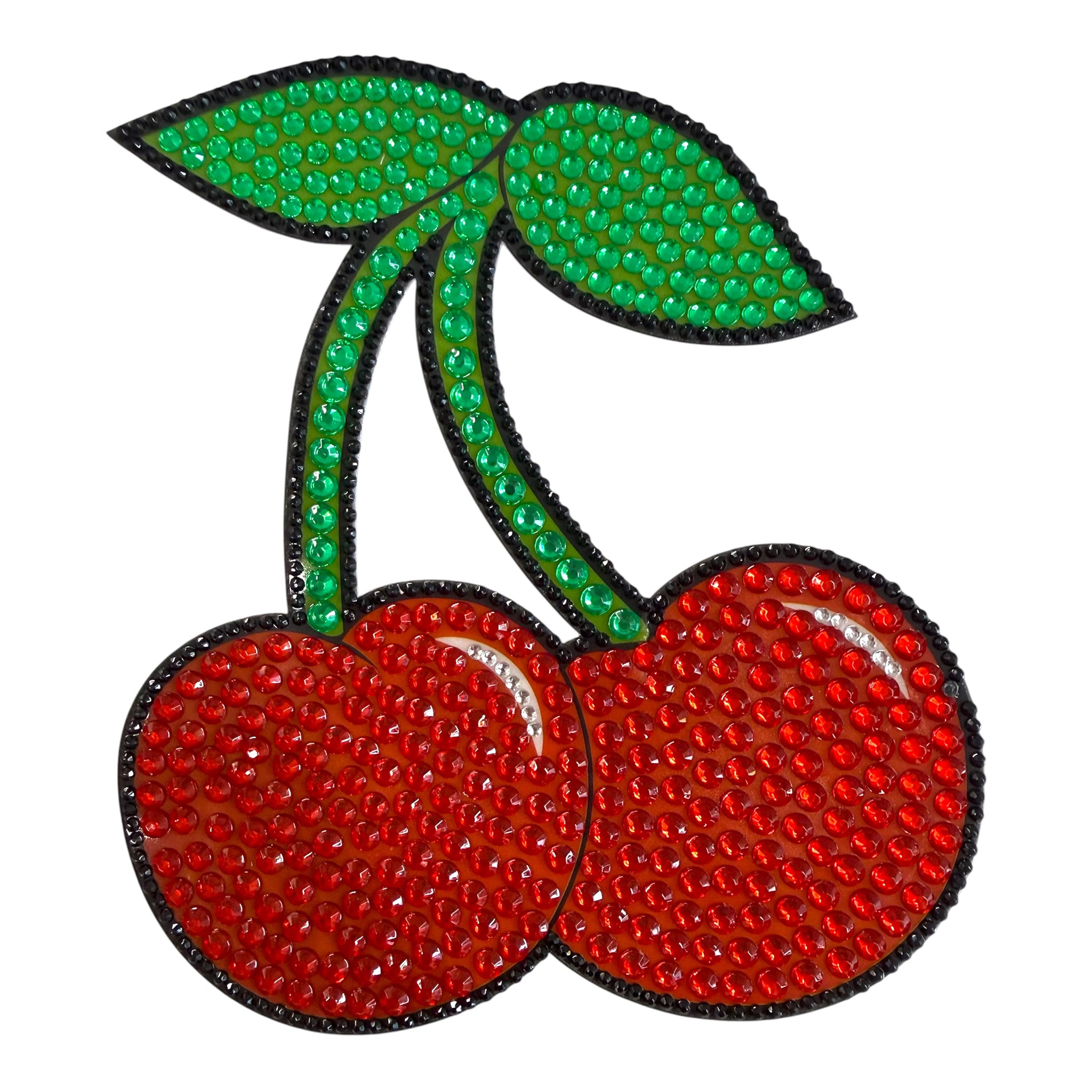 Decorative cherries with red stones on a white background