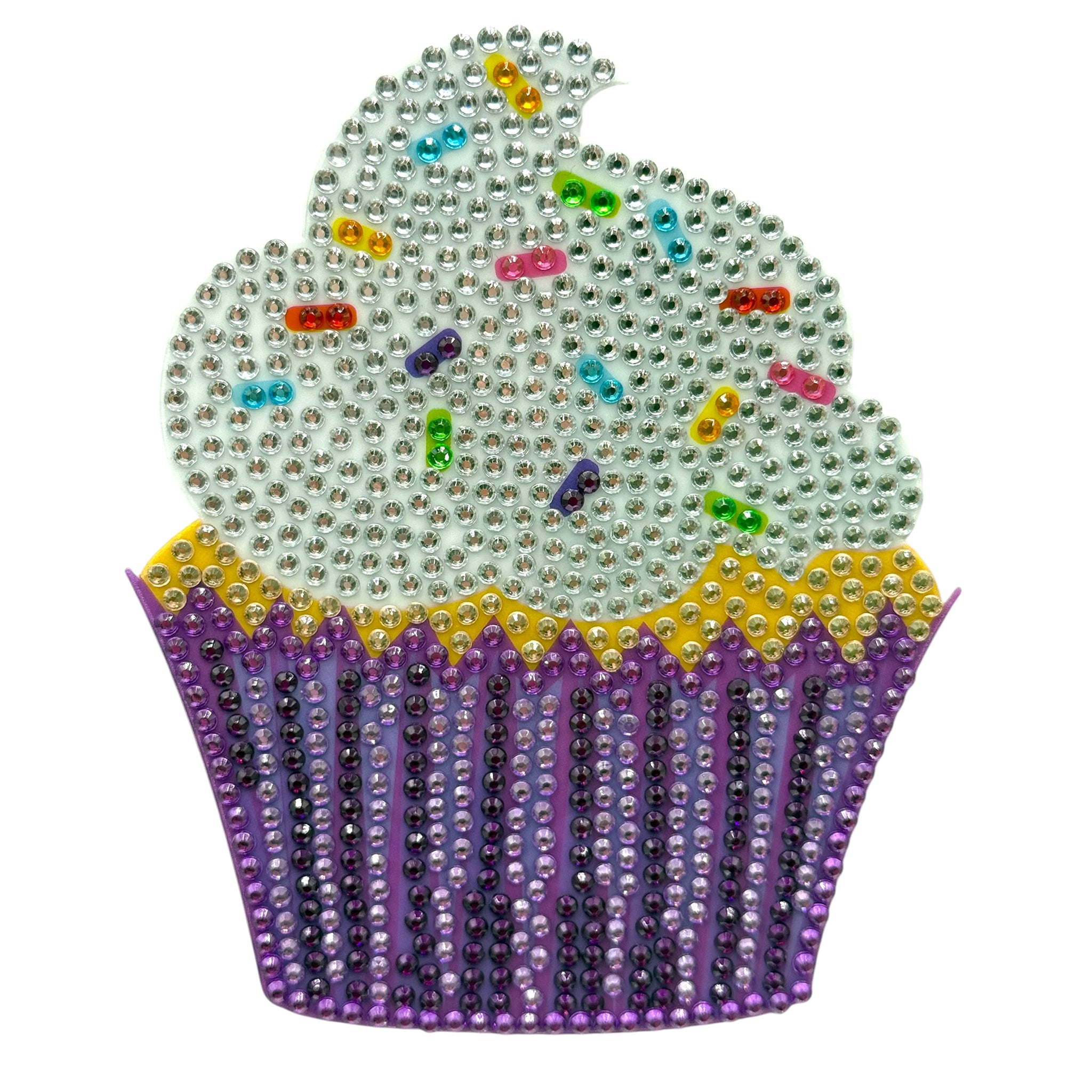 Decorative cupcake-shaped object with colorful rhinestones on a white background
