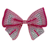 Pink and silver bow-shaped decorative item on a white background