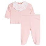 A baby girl's two-piece footed sleeper set in light pink, featuring a long-sleeve top with a white scalloped Peter Pan collar with pink embroidered bow details, and matching pink footed pants.