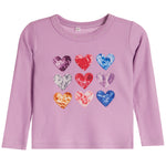 A toddler's long-sleeve waffle-knit top in light purple, featuring a graphic of nine tie-dye hearts in various colors arranged in a 3x3 grid on the front.