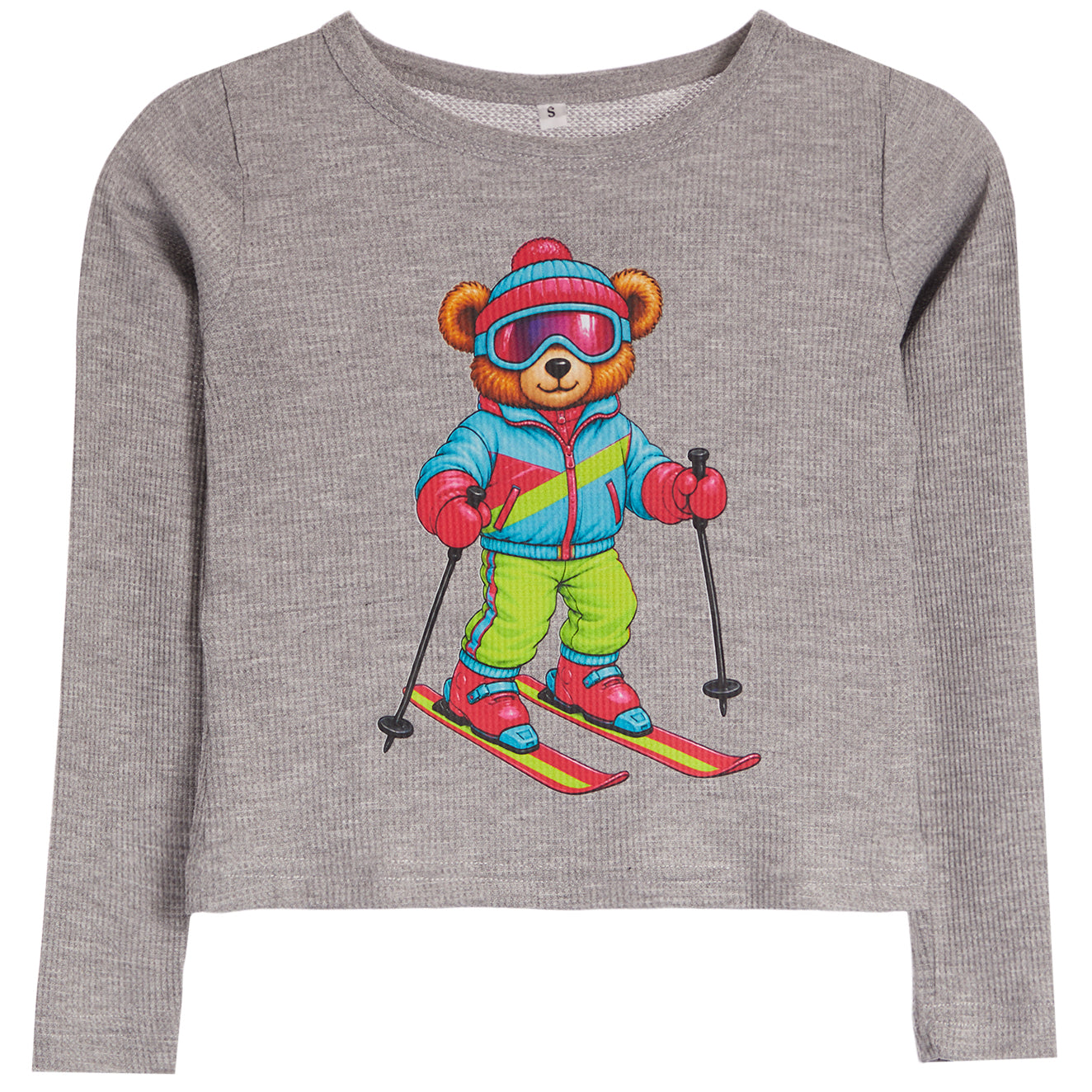 A heather gray long-sleeve crewneck sweatshirt featuring a colorful graphic of a teddy bear wearing a blue, pink, and yellow ski outfit with green pants and red skis.