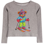 A heather gray long-sleeve crewneck sweatshirt featuring a colorful graphic of a teddy bear wearing a blue, pink, and yellow ski outfit with green pants and red skis.
