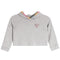 A light gray heather cropped hoodie sweatshirt with a small multicolor heart on the left chest, featuring a colorful striped trim along the hood.