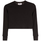 A black cropped long-sleeve knit sweater with a textured waffle pattern, shown flat against a white background. 