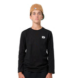 A young man wearing a black long-sleeve crewneck sweatshirt with a small white stylized 'D' logo on the left chest, paired with a tan baseball cap, photographed against a solid white background.