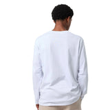 A person shown from the back wearing a plain white long-sleeve t-shirt and light beige pants against a solid white background.