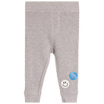 Light gray heathered knit baby pants with two small patches on the lower legs, one blue and one white.