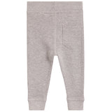 A pair of light gray heathered knit pants with a single back pocket and ribbed cuffs, shown flat against a white background.