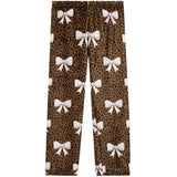 A pair of children's leggings featuring a brown leopard print pattern with white bow motifs repeated all over the fabric, shown flat against a solid white background.