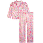 A two-piece pajama set consisting of a long-sleeve button-up top and matching pants, featuring a pink and white pattern of Mahjong tiles