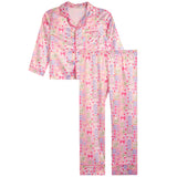 A two-piece pajama set consisting of a long-sleeve button-up top and matching pants, featuring a pink and white pattern of Mahjong tiles