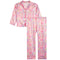 A two-piece pajama set consisting of a long-sleeve button-up top and matching pants, featuring a pink and white pattern of Mahjong tiles