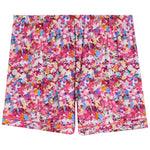 A pair of pajama shorts featuring an all-over multicolor abstract pattern with pink, blue, orange, and white shapes, set against a plain white background.