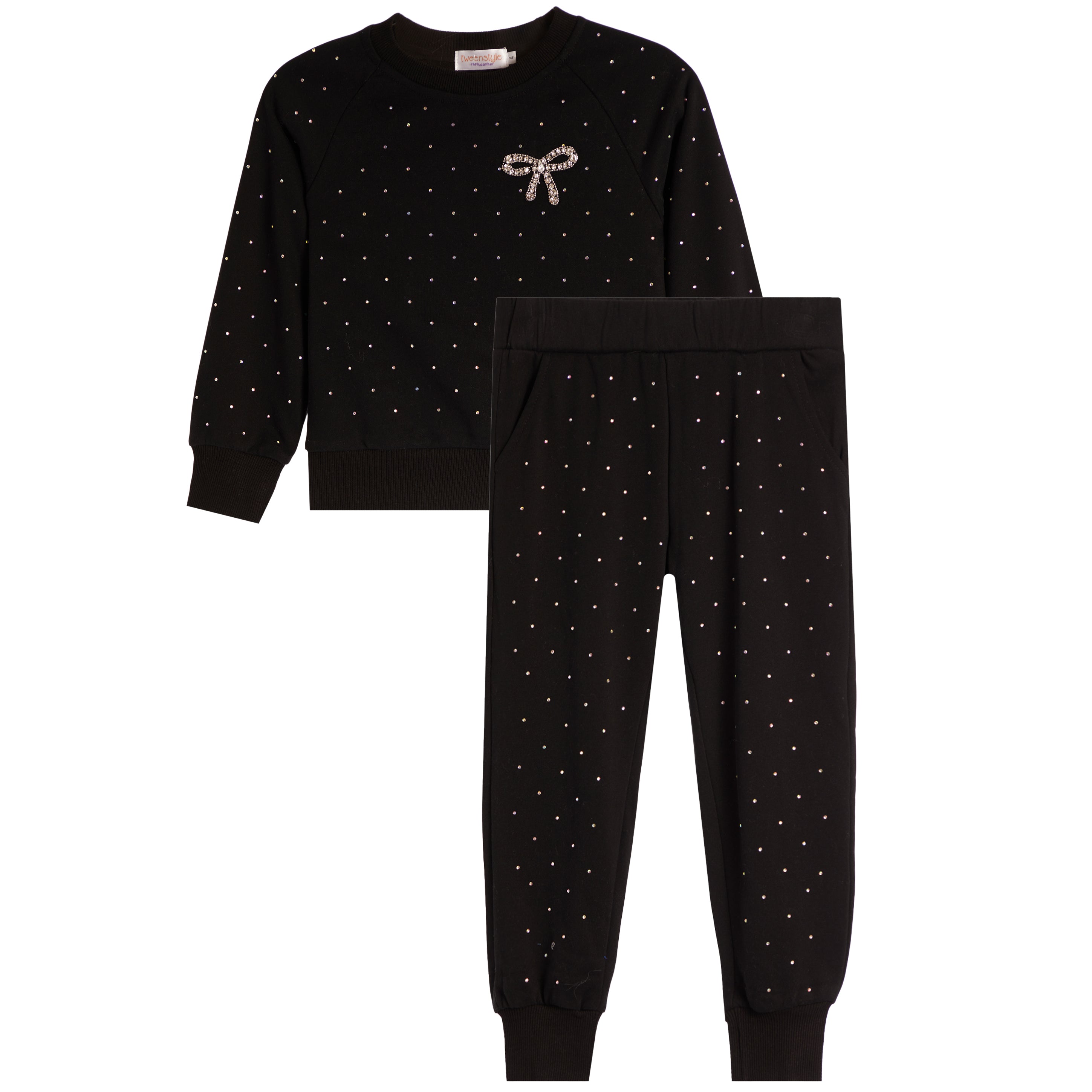 A two-piece kids' loungewear set in black, featuring a long-sleeve sweatshirt with a small bow embellishment on the chest and matching jogger pants, both decorated with tiny white polka dots.