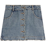 A light blue denim mini skirt with a scalloped front hem, featuring a button closure down the center and classic front patch pockets, shown against a plain white background.