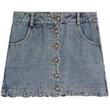 A light blue denim mini skirt with a scalloped front hem, featuring a button closure down the center and classic front patch pockets, shown against a plain white background.