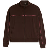 A dark brown zip-up jacket with a stand collar, featuring thin pink piping accents running horizontally across the chest and vertically down the sleeves, shown against a plain white background.