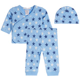 A baby sleepwear set including a light blue long-sleeve wrap sleeper, matching pants, and a beanie, all featuring an all-over star pattern in navy blue and white.