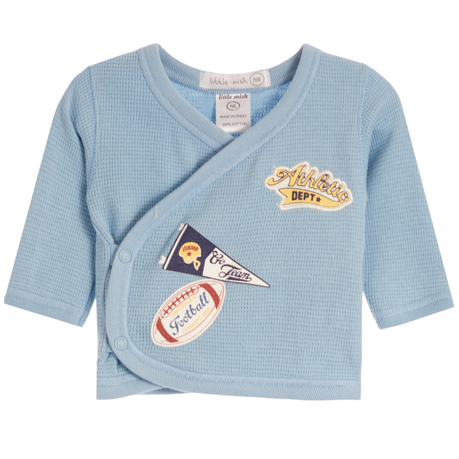 A light blue waffle-knit baby wrap shirt by Little Meek, featuring embroidered sports patches including a 'Athletics DEPT.' patch and a football patch on the front.