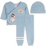 A three-piece baby outfit set in light blue waffle-knit fabric, including a long-sleeve wrap top with sports patch details, matching jogger pants with white stripes, and a matching beanie hat, displayed on a clean white background.